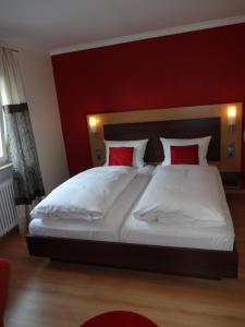 Voodi või voodid majutusasutuse Hotel Ricci toas