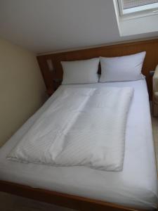 Voodi või voodid majutusasutuse Hotel Ricci toas