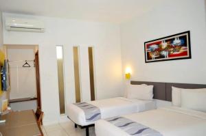 Cama o camas de una habitación en Hotel Koening