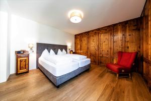 Postel nebo postele na pokoji v ubytování Hotel Münsterhof