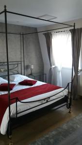 Postel nebo postele na pokoji v ubytování B&B Villa Des Raisins
