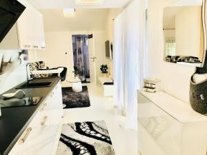 Kuchyň nebo kuchyňský kout v ubytování Apartmani Beril Lux + 37 fotografií