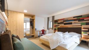 Letto o letti in una camera di Hotel Weihrerhof