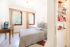 Postel nebo postele na pokoji v ubytování B&B Casa Baseggio