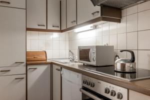 Eldhús eða eldhúskrókur á Das Kaltschmid - Familotel Tirol
