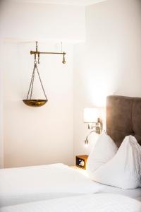 Postel nebo postele na pokoji v ubytování Hotel Münsterhof