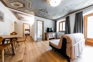 Postel nebo postele na pokoji v ubytování Hotel Münsterhof