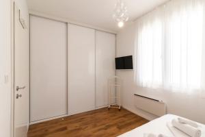 Postel nebo postele na pokoji v ubytování Apartment In Centre For 6