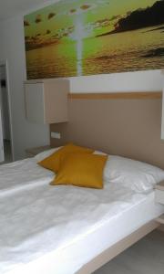 Postel nebo postele na pokoji v ubytování Jurman Apartment