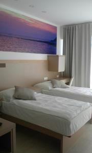 Postel nebo postele na pokoji v ubytování Jurman Apartment