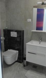 Koupelna v ubytování Jurman Apartment