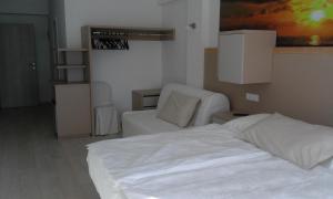 Postel nebo postele na pokoji v ubytování Jurman Apartment