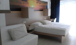 Postel nebo postele na pokoji v ubytování Jurman Apartment