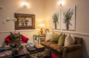 Posezení v ubytování Goble Palms Guest Lodge & Urban Retreat