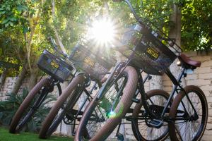 
a row of bikes parked next to each other at Santiago Resort - Palm Springs Premier Gay Men’s Resort in Palm Springs
