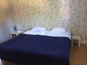 Postel nebo postele na pokoji v ubytování Classic Leksand