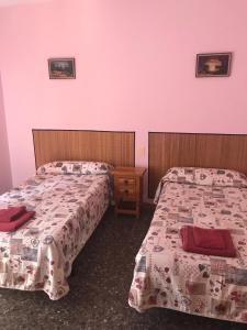 Postel nebo postele na pokoji v ubytování Hostal L'Escaleta