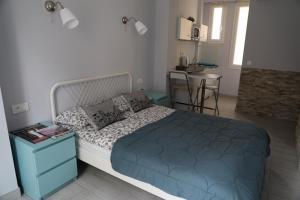 Giường trong phòng chung tại Apartments Monaco