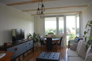 A seating area at Green View Apartment