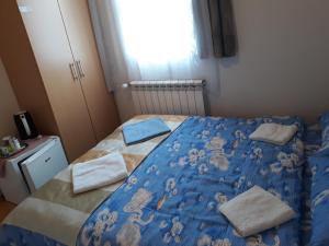 Voodi või voodid majutusasutuse Rooms Skorpijon toas