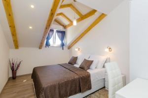 Posteľ alebo postele v izbe v ubytovaní Apartments Pavle