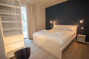 Posteľ alebo postele v izbe v ubytovaní Italianflat - Maison du Lac