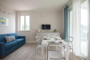 Televízia a/alebo spoločenská miestnosť v ubytovaní Italianflat - Maison du Lac