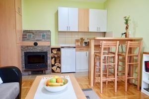 Kuchyň nebo kuchyňský kout v ubytování Apartments Milic