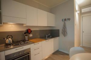 Kuchyňa alebo kuchynka v ubytovaní Italianflat - Maison du Lac