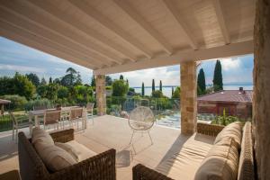 Posedenie v ubytovaní Italianflat - Maison du Lac