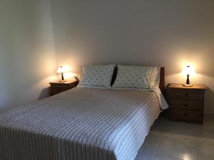 Postel nebo postele na pokoji v ubytování ntinas house