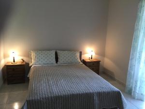 Postel nebo postele na pokoji v ubytování ntinas house