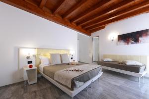 Posteľ alebo postele v izbe v ubytovaní Best Western Hotel Principe di Lampedusa + 37 fotografií