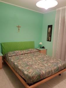 Postel nebo postele na pokoji v ubytování Casa Melania