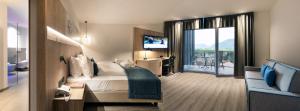 TV a/nebo společenská místnost v ubytování Hotel Christof