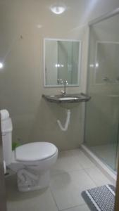 Koupelna v ubytování Hotel Uzi Praia