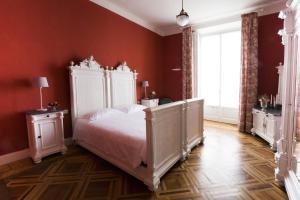 A bed or beds in a room at Villa Martelli