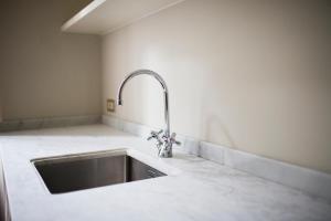 A bed or beds in a room at Villa Martelli