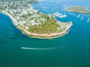 an aerial view of an island in the water at Thou Walla Sunset Retreat in Soldiers Point