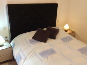 A bed or beds in a room at Apartamento Marina Nacional