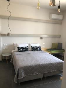 Voodi või voodid majutusasutuse Afrodete Hotel toas