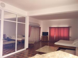Ένα ή περισσότερα κρεβάτια σε δωμάτιο στο Sahamalaza