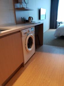 Kuchyň nebo kuchyňský kout v ubytování Hotel Winstory