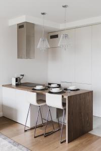 Kuchyňa alebo kuchynka v ubytovaní LuxLux Apartments Coconut