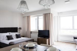 Posteľ alebo postele v izbe v ubytovaní LuxLux Apartments Coconut