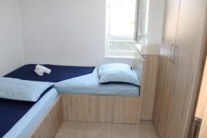 Ein Bett oder Betten in einem Zimmer der Unterkunft Vila Apartment