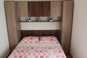 Ein Bett oder Betten in einem Zimmer der Unterkunft Vila Apartment