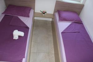 Ein Bett oder Betten in einem Zimmer der Unterkunft Vila Apartment