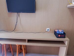 Gallery image of Cozy 1BR Scientia Residence Apartment near Summarecon Mall Gading Serpong By Travelio in Tangerang +10 photos