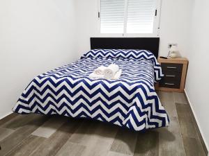 Postel nebo postele na pokoji v ubytování Apartamento Completo Plaza España